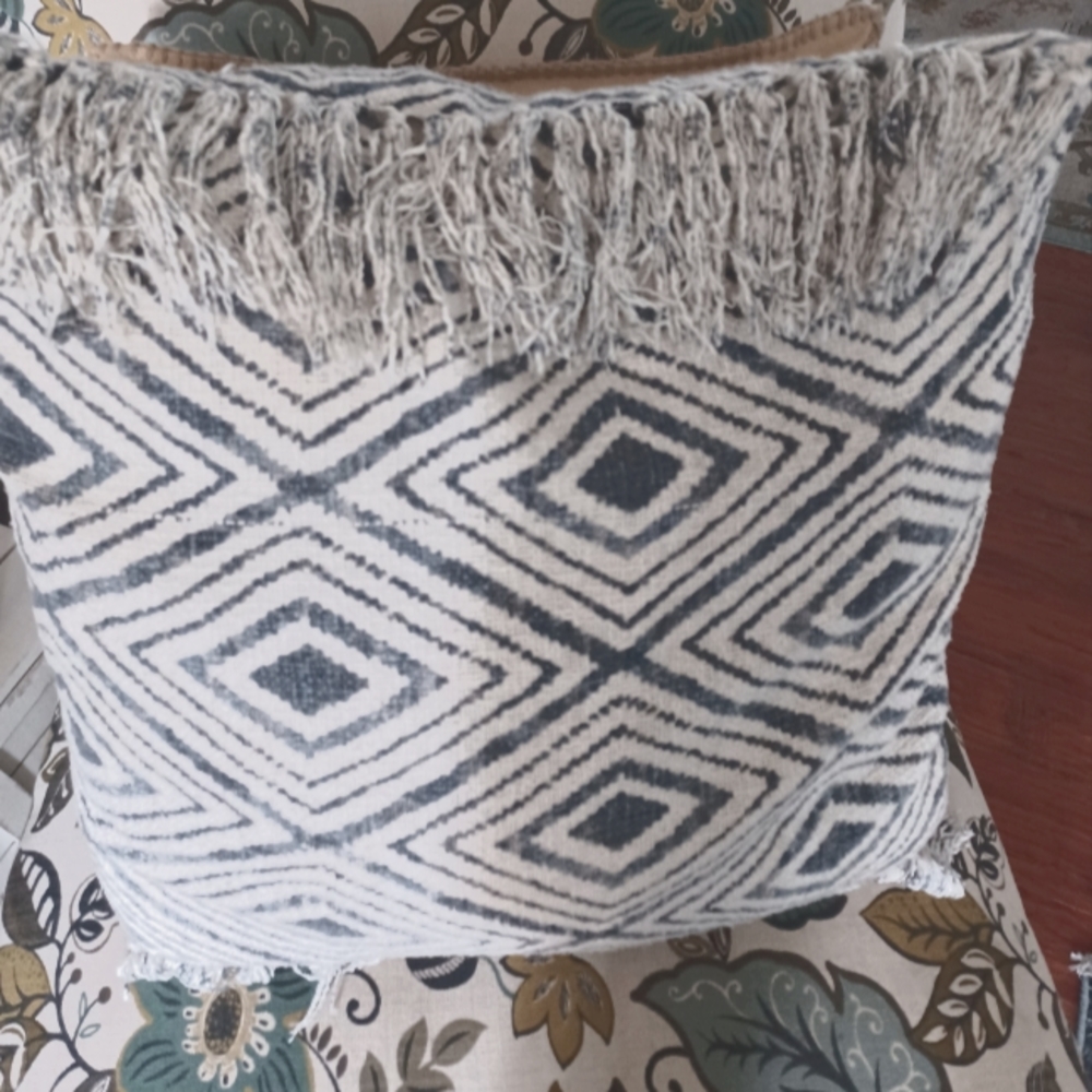 Cream and navy blue pillow